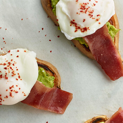 Sweet potatoes, JENNIE-O® Turkey Bacon and poached egg on toast.