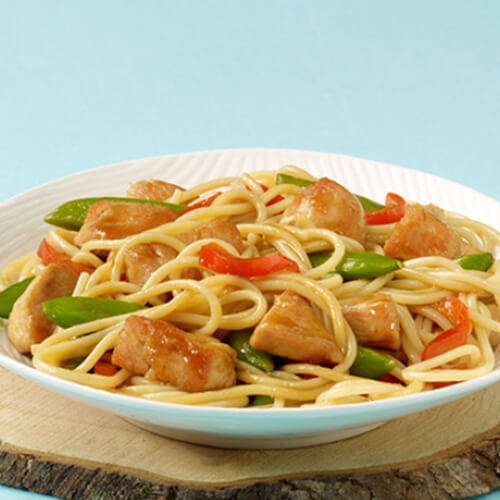 Lo mein noodles tossed in a tasty asian sauce with chunks of turkey, peas, and red bell peppers.